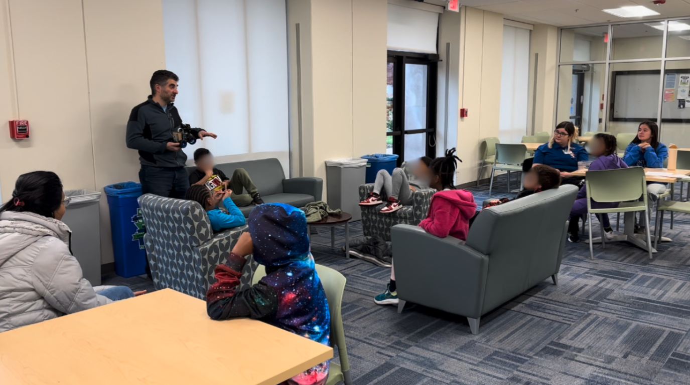 Professor Esposito talking to kids